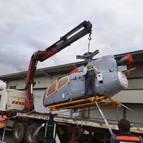 Self loader truck for material transportation